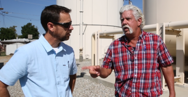 Image: Scott Taylor (right) of Lamont Public Utility District with consultant engineer Curtis Skaggs (left).