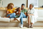 African American happy family is enjoying in living room