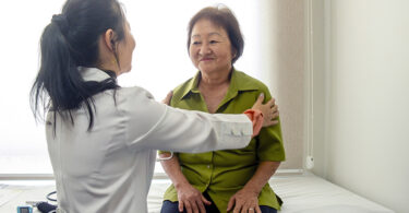 Doctor and patient in the doctor's office.