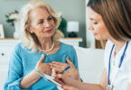 Senior woman listening to female doctor