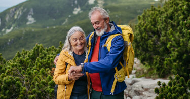 Retired couple hiking together