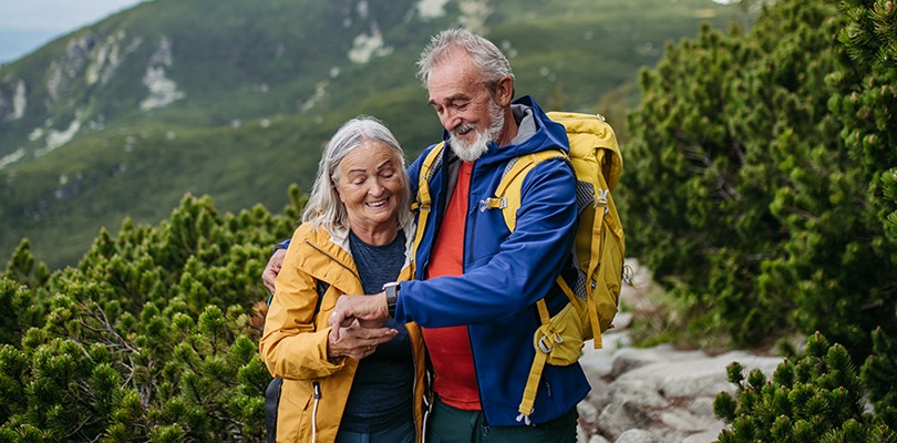 Retired couple hiking together