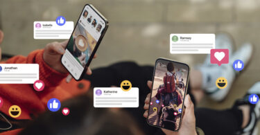 Two hands holding phones with general social media applications open, emojis decorating the foreground