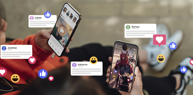 Two hands holding phones with general social media applications open, emojis decorating the foreground